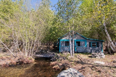 Tucked away on coveted Sebec Lake, this rustic camp feels like - photo 49