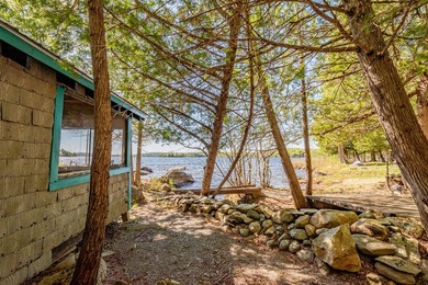 Tucked away on coveted Sebec Lake, this rustic camp feels like - photo 50