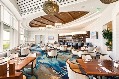 Nestled within the gated community of Hideaway Beach Club, this - photo 8