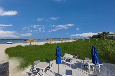 Nestled within the gated community of Hideaway Beach Club, this - photo 9