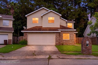 Move-in ready home in the heart of D'Iberville! This - photo 1