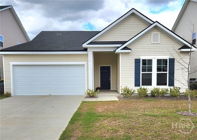 Like New! This 3-bedroom, 2-bath home features valuable upgrades - photo 1