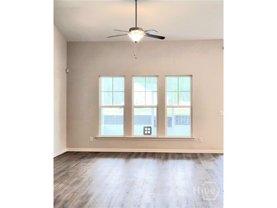 Like New! This 3-bedroom, 2-bath home features valuable upgrades - photo 2