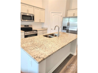 Like New! This 3-bedroom, 2-bath home features valuable upgrades - photo 3