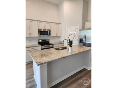 Like New! This 3-bedroom, 2-bath home features valuable upgrades - photo 4