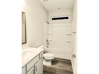 Like New! This 3-bedroom, 2-bath home features valuable upgrades - photo 6