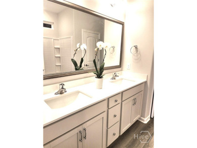 Like New! This 3-bedroom, 2-bath home features valuable upgrades - photo 9