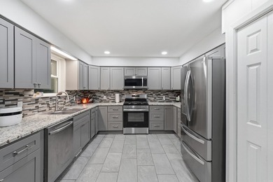 Welcome to this beautifully updated all-brick home nestled in a - photo 18