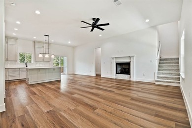 Stunning new construction home on a beautiful wooded lot! Just - photo 3
