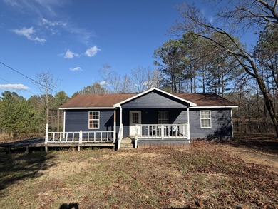 Lake Home For Sale in Mantee, Mississippi
