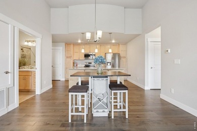 Enjoy low-maintenance living in this third-floor end-unit condo