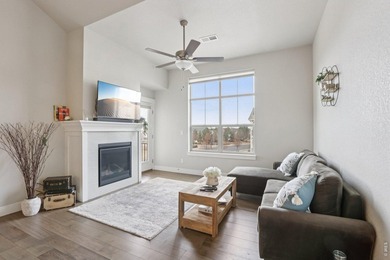 Enjoy low-maintenance living in this third-floor end-unit condo