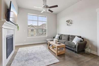 Enjoy low-maintenance living in this third-floor end-unit condo