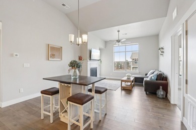 Enjoy low-maintenance living in this third-floor end-unit condo