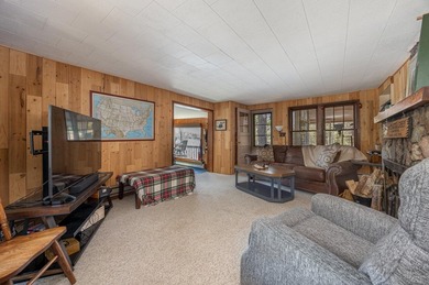 On the shores of beautiful Woman Lake, this home captures the - photo 12