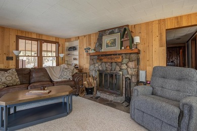On the shores of beautiful Woman Lake, this home captures the - photo 14