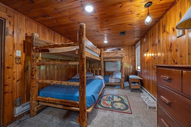 On the shores of beautiful Woman Lake, this home captures the - photo 20