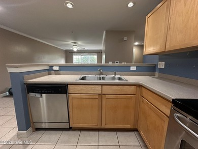 1st-floor end unit offers incredible potential and is ideally - photo 12