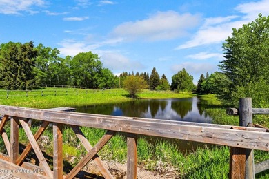 Welcome to your private 18-acre horse property in the highly - photo 16