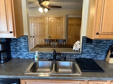 This well-maintained lake home has been totally remodeled with - photo 16