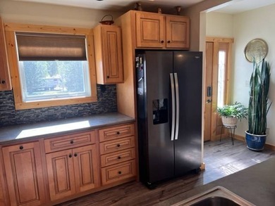 This well-maintained lake home has been totally remodeled with - photo 17