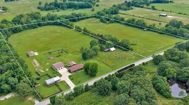 Nice one-owner home on 13.39 clear acres with many outbuildings - photo 1
