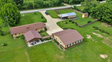 Nice one-owner home on 13.39 clear acres with many outbuildings - photo 4