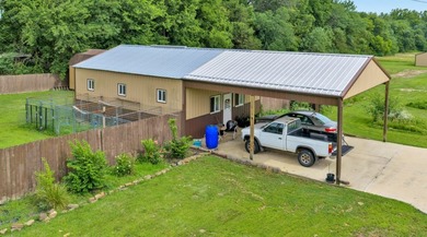 Nice one-owner home on 13.39 clear acres with many outbuildings - photo 9