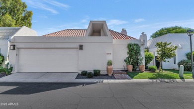 Located in a prestigious gated community at the world-renowned - photo 1