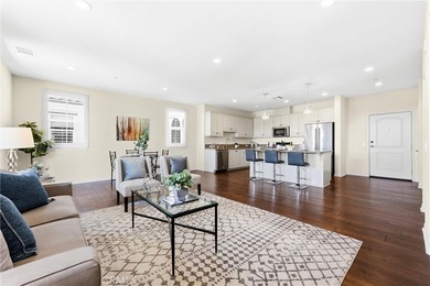 Introducing a stunning top-floor, single-story residence in the - photo 3