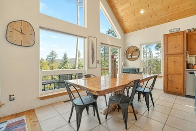 Nestled among the tall pines of Angel Fire, this warm and - photo 13