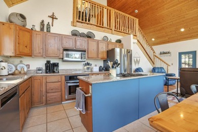 Nestled among the tall pines of Angel Fire, this warm and - photo 15