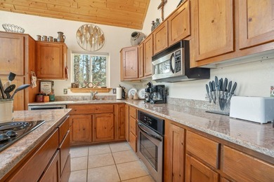 Nestled among the tall pines of Angel Fire, this warm and - photo 17