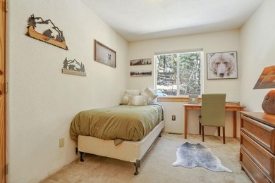 Nestled among the tall pines of Angel Fire, this warm and - photo 24