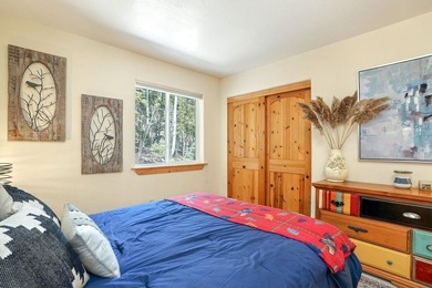 Nestled among the tall pines of Angel Fire, this warm and - photo 27