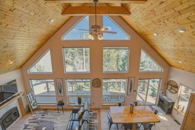 Nestled among the tall pines of Angel Fire, this warm and - photo 32
