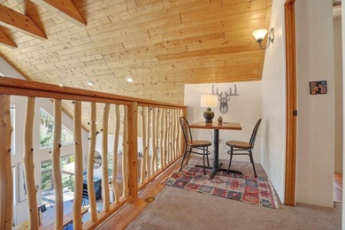 Nestled among the tall pines of Angel Fire, this warm and - photo 34