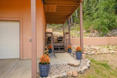 Nestled among the tall pines of Angel Fire, this warm and - photo 50