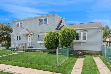 This spacious and well-maintained 5-bedroom, 2-full-bath home is - photo 2