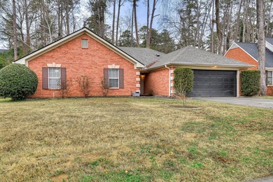 Welcome home to this beautiful four bed, two bath full brick - photo 3