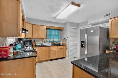 Welcome home to this beautifully updated 4 bedroom, 2.5 bathroom - photo 3