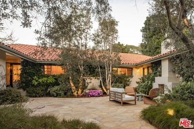 Set on a rare half-acre lot just moments from the Riviera - photo 1
