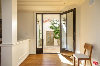 Set on a rare half-acre lot just moments from the Riviera - photo 2