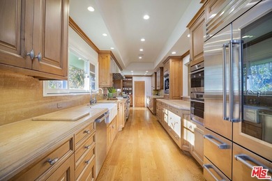 Set on a rare half-acre lot just moments from the Riviera - photo 7
