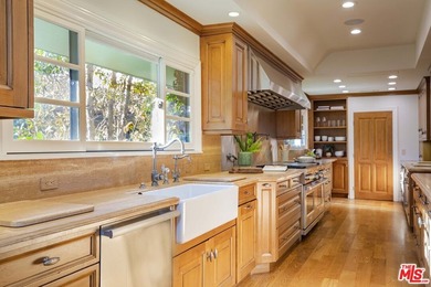 Set on a rare half-acre lot just moments from the Riviera - photo 8