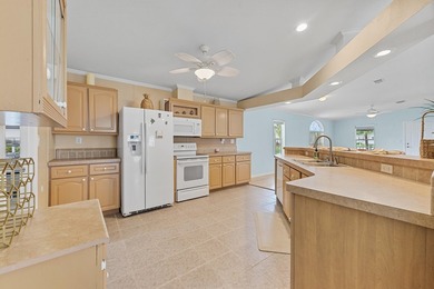 Welcome to this charming 3-bedroom, 2-bathroom waterfront home - photo 16