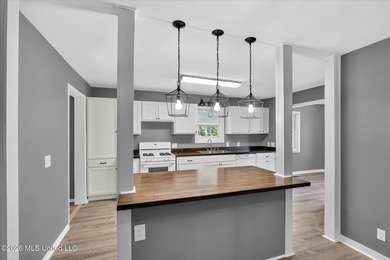 Welcome to Bayou View! This beautifully updated 3-bedroom - photo 2