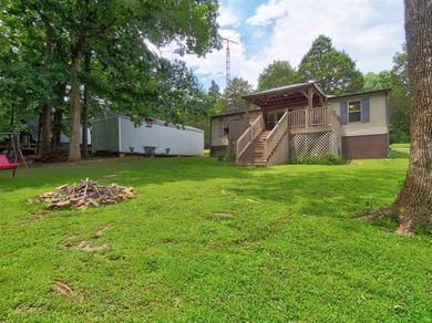 Welcome to lake life at Rough River Lake! This fully furnished - photo 22