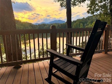 Tucked inside the gated community of Riverbend at Lake Lure