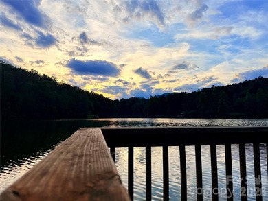 Tucked inside the gated community of Riverbend at Lake Lure